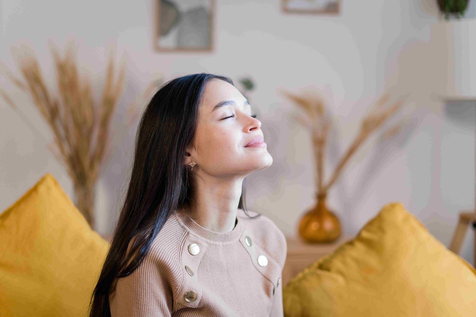 dreamy-woman-with-closed-eyes-in-living-room-resti-2025-01-08-10-19-05-utc_11zon